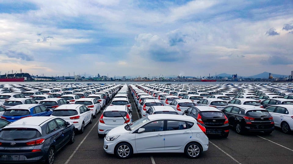Sea of cars at a car factory